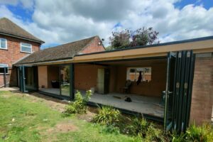 Origin bifold doors in Peterborough to a detached house with garden views