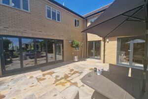 Schüco aluminium doors in a French style in white brick house